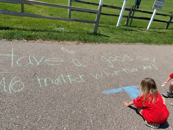child sidewalk chalk drawing